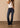 Women's Bootcut Jeans in blue by Kimes Ranch, featuring mid-rise fit and bootcut opening, styled with a white t-shirt.