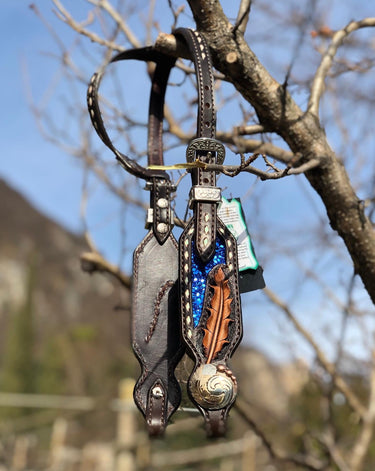 testiera lavorata a mano con piuma