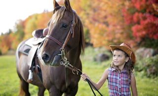 Bambina con cavallo