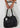 in mano Borsa We The Free Emerson Tote in Black di Free People