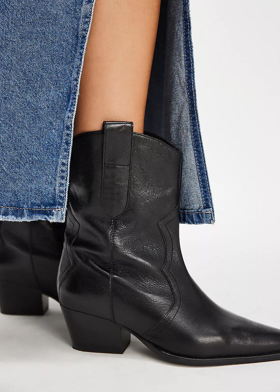 Cowboy Boots Women's Cat Nap Cowboy by Free People, black leather ankle boots worn with denim skirt.