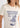 dettaglio design T-Shirt Slim Ringer Tee Cowboy in Worn White by Wrangler